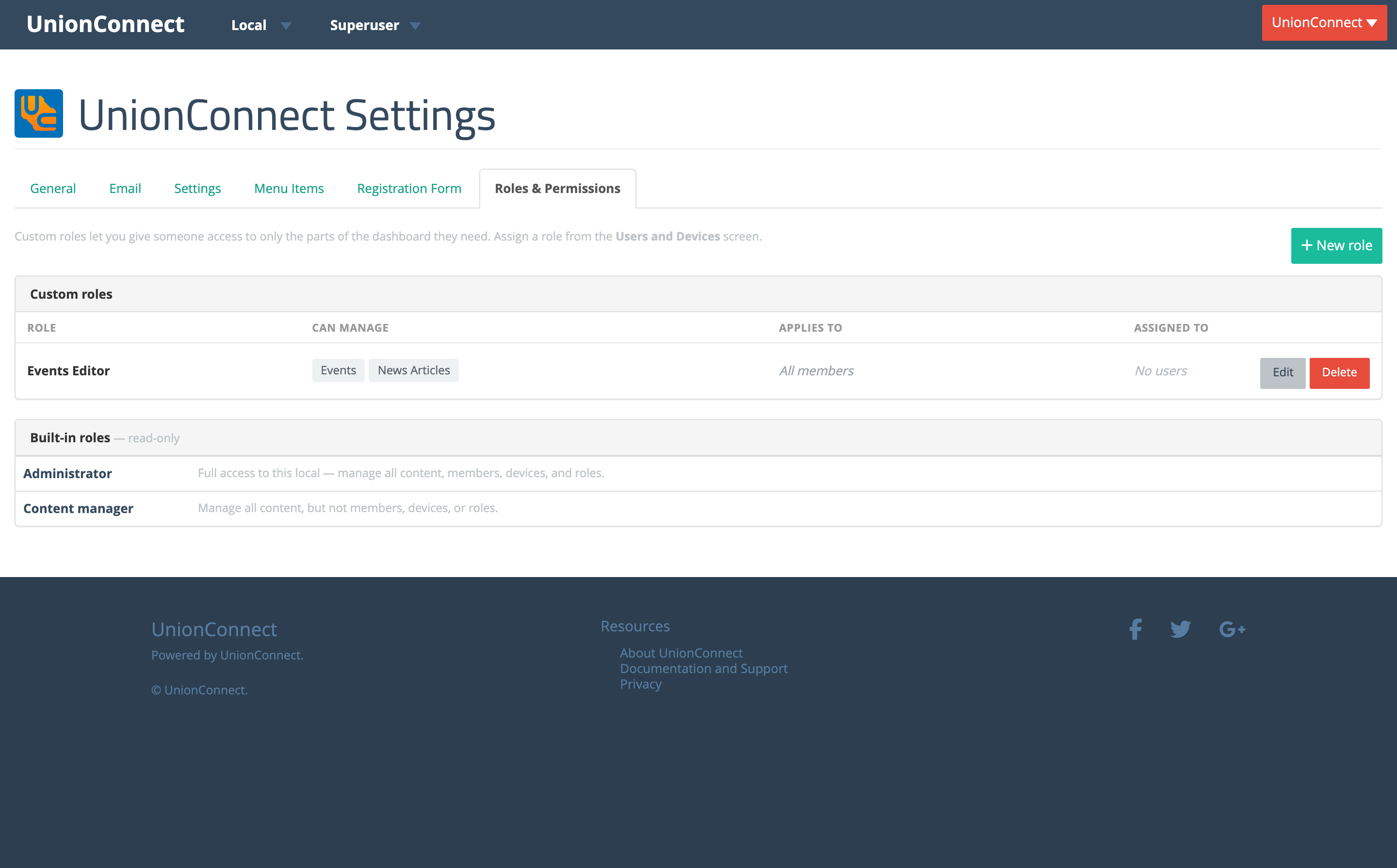 Roles & Permissions page showing a Custom roles table and a read-only Built-in roles panel