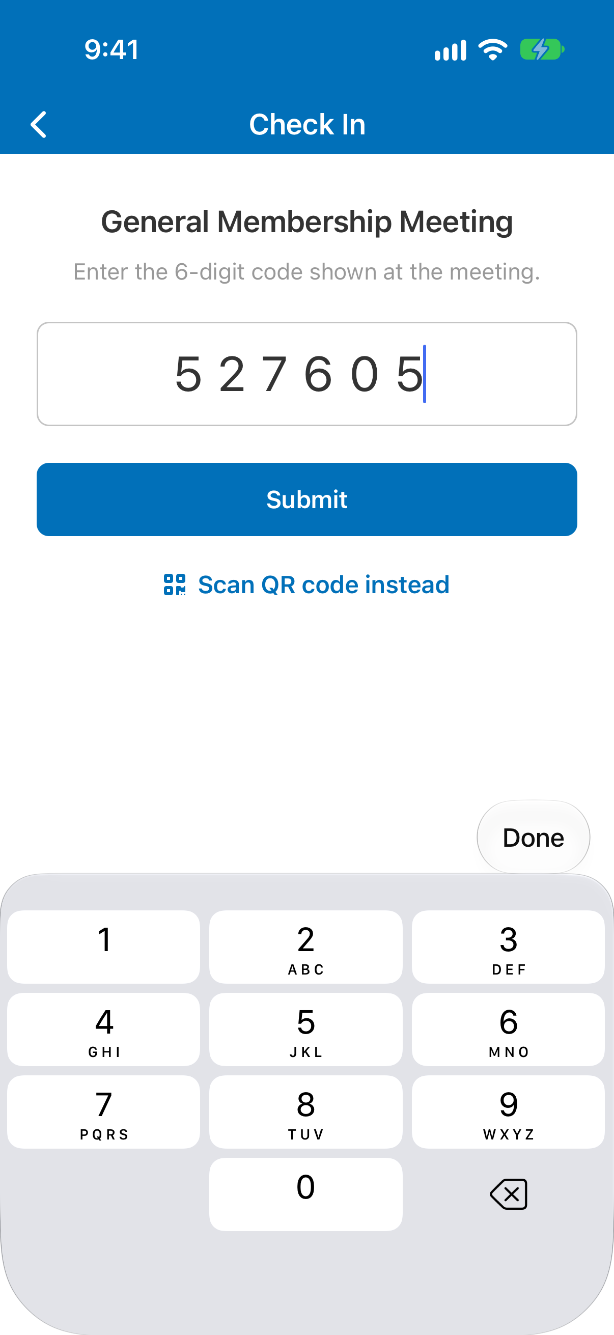 The same screen with a six-digit code typed into the field and the number pad open.